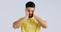 Stress, anxiety and a young asian man in studio isolated on a white background for mental health. Burnout, headache and