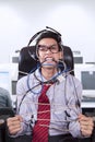 Stress businessman tied in rope at office Royalty Free Stock Photo