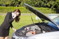 Stress businesswoman calling for help with car broken concept