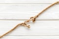 Stress concept with breaking rope on white wooden background top view mockup Royalty Free Stock Photo