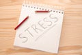 Stress concept. stress relief and management concept. notepad with word stress and broken pencil in madness Royalty Free Stock Photo