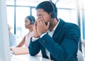 Stress, customer support and call center employee with a headache in a workplace with headset. Customer service, crm and Royalty Free Stock Photo