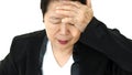 Stress facial expression Asian senior businesswoman dealing with problems at work Royalty Free Stock Photo