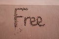 Stress Free Written On Sand Near The Sea At Beach Royalty Free Stock Photo