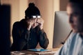 Stress, headache and business black woman at night working on project, report and strategy deadline. Burnout, fatigue Royalty Free Stock Photo