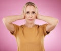 Stress, loud and portrait of a woman with a problem isolated on a pink background in a studio. Sound, frustrated and