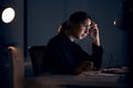 Stress, night and business woman on computer working on project, planning and strategy deadline. Burnout, mental health Royalty Free Stock Photo