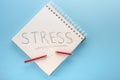 Stress relief concept. notepad with word stress and broken pencil in case of panic attack. Reduce Stress Royalty Free Stock Photo