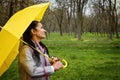 Stress resilience and mental health, concept. Managing stress and building resilience. Happy senior woman in yellow rain