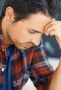 Stress, thinking and man with headache from anxiety in home or closeup of crisis in mental health. Frustrated, person or Royalty Free Stock Photo