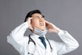 Stress and tired young Doctor Wear Medical Mask Royalty Free Stock Photo