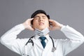 Stress and tired young Doctor Wear Medical Mask Royalty Free Stock Photo