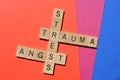 Stress, Trauma, Angst, crossword on red, pink and blue Royalty Free Stock Photo