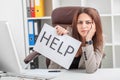 Stress. Unhappy Young Business woman, needs help to manage work Royalty Free Stock Photo