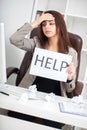 Stress. Unhappy Young Business woman, needs help to manage work Royalty Free Stock Photo