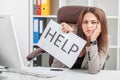 Stress. Unhappy Young Business woman, needs help to manage work Royalty Free Stock Photo