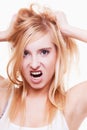 Stress. woman frustrated pulling her hair on white Royalty Free Stock Photo