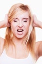 Stress. Young woman frustrated pulling her hair on white Royalty Free Stock Photo