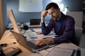 Stressed Accountant Working Late In Office Royalty Free Stock Photo