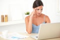 Stressed adult woman working on her computer Royalty Free Stock Photo