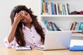 Stressed african american woman at computer Royalty Free Stock Photo