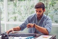 Stressed anxious businessman in a hurry checking time Royalty Free Stock Photo