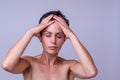 Stressed anxious woman with a headache Royalty Free Stock Photo