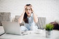 Stressed Asia woman with computer