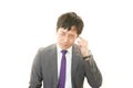 Stressed Asian businessman Royalty Free Stock Photo