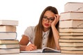 Stressed asian caucasian woman student learning in tons of books Royalty Free Stock Photo