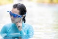 Stressed asian girl had tinnitus,problem with water entering the ear canal while swimming,female people cleaning ears after diving