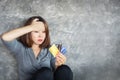 Stressed Asian woman hand holding credit cards having problem with overspending and debt Royalty Free Stock Photo