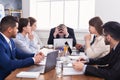 Stressed boss having problem at business meeting Royalty Free Stock Photo