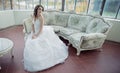 Stressed bride wearing beautiful wedding gown