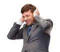 Stressed buisnessman or teacher closing ears Royalty Free Stock Photo