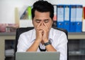 Stressed business man using laptop and working problem Royalty Free Stock Photo