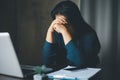 Stressed business woman. Tired business woman sleepy and bored from sitting at a desk for a long time and has office syndrome. Royalty Free Stock Photo