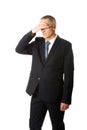 Stressed businessman covering his face Royalty Free Stock Photo