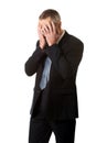 Stressed businessman covering his face with hands Royalty Free Stock Photo