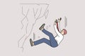 Stressed businessman fall down from rock