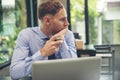 Stressed businessman, Frustrated and upset in business pressure, and overworked at office. Adult Caucasian male working on laptop Royalty Free Stock Photo