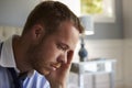 Stressed Businessman Getting Dressed For Work Royalty Free Stock Photo