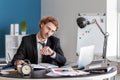 Stressed businessman missing deadlines in office Royalty Free Stock Photo