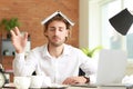 Stressed businessman missing deadlines in office Royalty Free Stock Photo