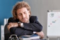 Stressed businessman missing deadlines in office Royalty Free Stock Photo