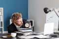 Stressed businessman missing deadlines in office Royalty Free Stock Photo