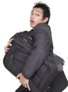 Stressed businessman running w luggage Royalty Free Stock Photo
