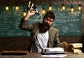 Stressed businessman shout with microscope. Man with beard and mustache on angry face. Bearded man with book and retro