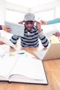 Stressed businessman sitting at desk Royalty Free Stock Photo