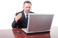 Stressed businessman sweating in his office Royalty Free Stock Photo